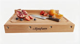 Planche réversible 40 x32 cm Manufrance coté avec rigole et présentation avec fruits